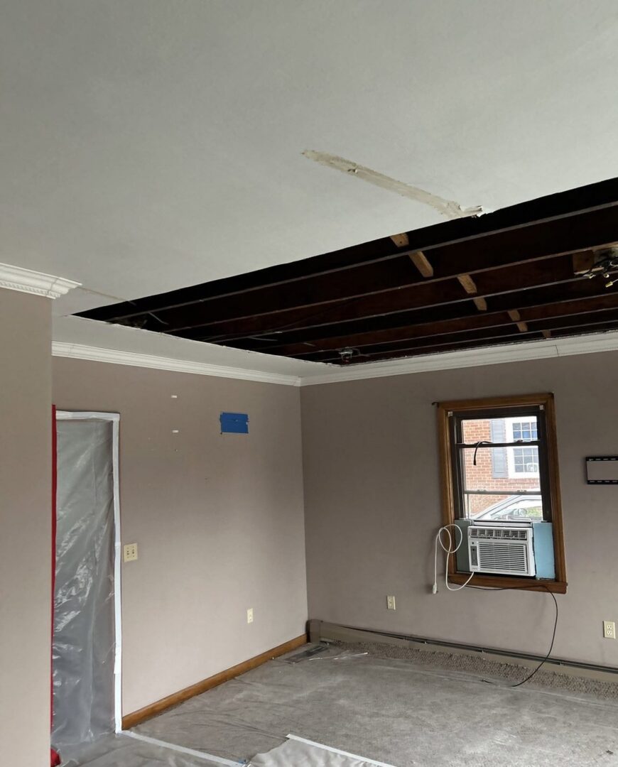 Room with the ceiling removed and joists exposed