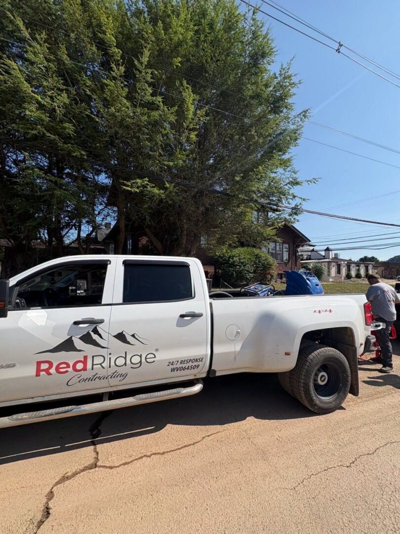Red Ridge Contracting trucks and crew on a West Virginia job site